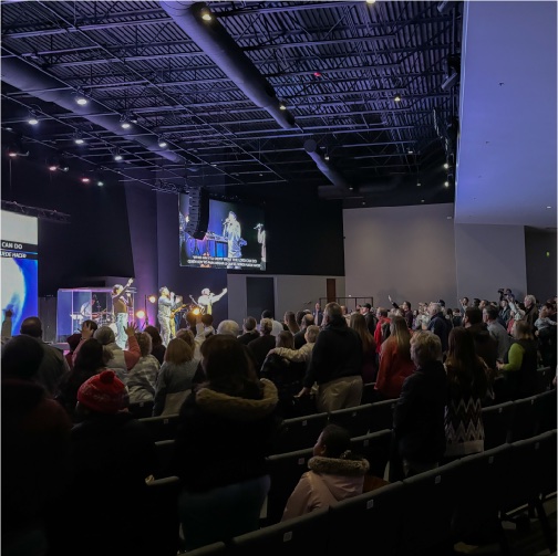 The congregation worshiping in the new worship center